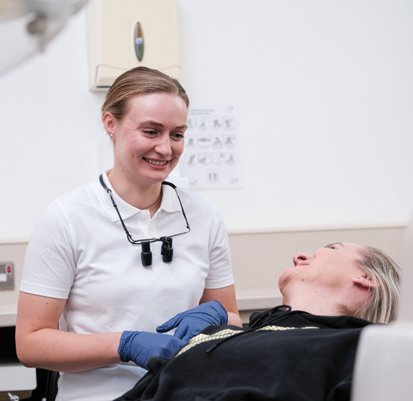 Megan with patient during examination